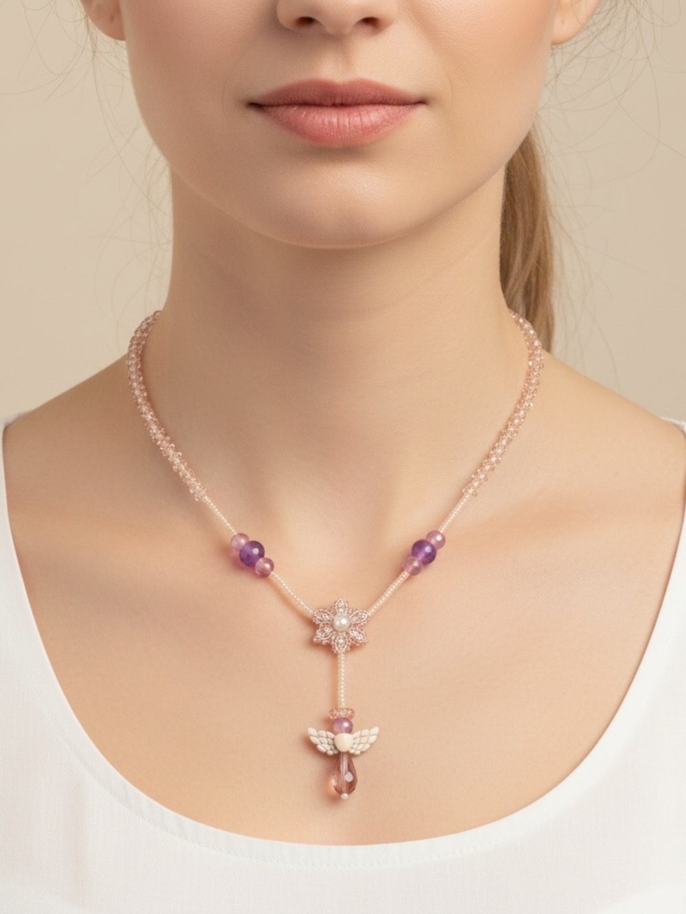 Gold-Tone Necklace with Purple Beads and Angel Pendant